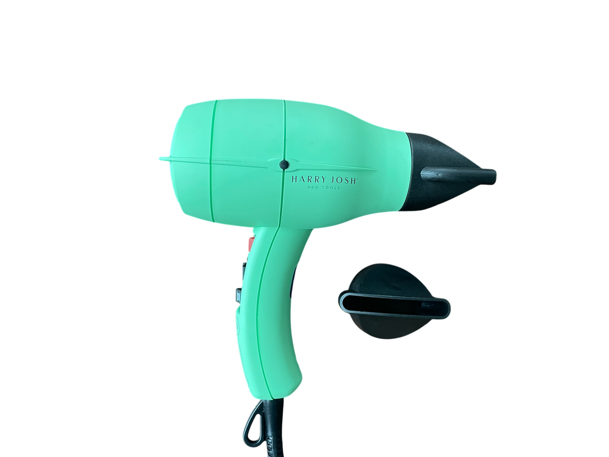 Right side view of the Harry Josh Pro Dryer 2000 highlighting ergonomic curved handle and control buttons